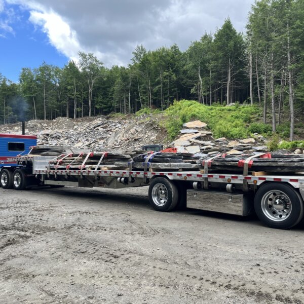 Premium Goshen stone slabs at Lilly Pond Quarry in Massachusetts, ready for landscaping and construction projects.